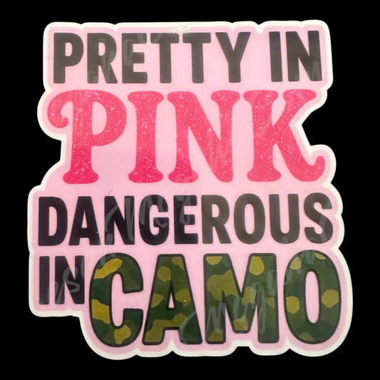 Sticker with text 'Pretty in Pink, Dangerous in Camo' on a pink background