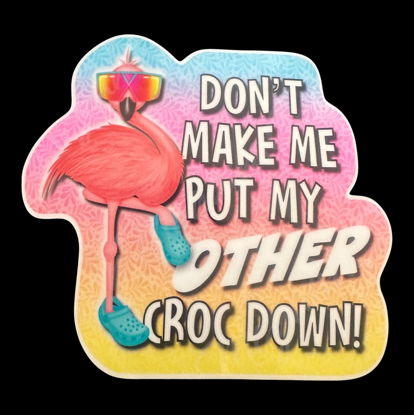 Flamingo with sunglasses and text 'Don't make me put my other croc down!' on a colorful background